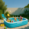 Sparkling blue inflatable pool in a sunlit modern backyard with lush greenery and inviting poolside decor