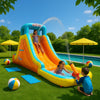 Premium inflatable water slide on lush grass with pool, sun umbrellas, towels, and beach balls in a bright backyard scene