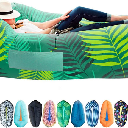 green inflatable camping lounger