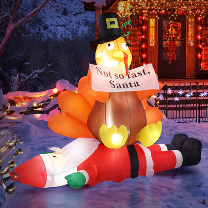 inflatable turkey sitting on santa